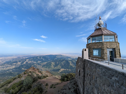 Historic stone tower on Mount Diablo summit with expansive valley views below