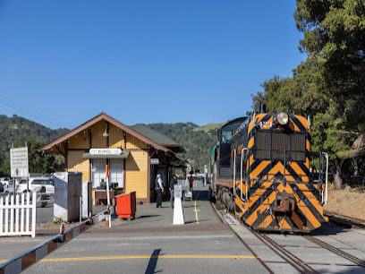Niles Canyon Railway station with vintage diesel locomotive and wooden depot building